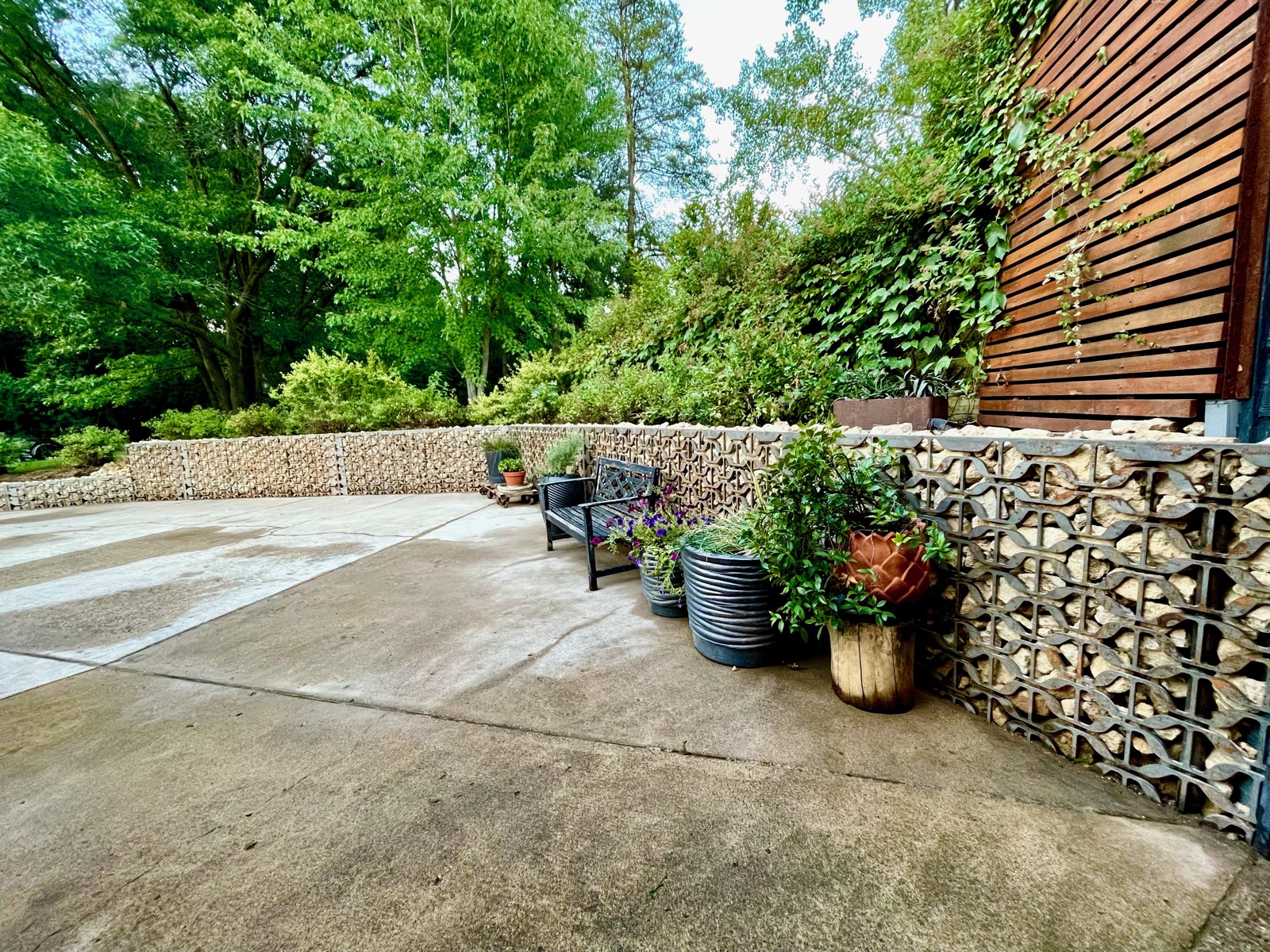 Hardscaped patio and gabion walls prepared and built by Aaron Brand